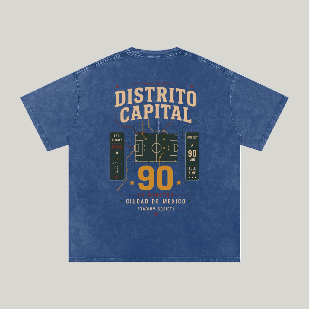 Back of Dark Blue washed oversized T-shirt with a large Distrito Capital 90 poster graphic