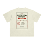 Back of Apricot enzyme-washed T-shirt with a large Mexico Away Days travel graphic