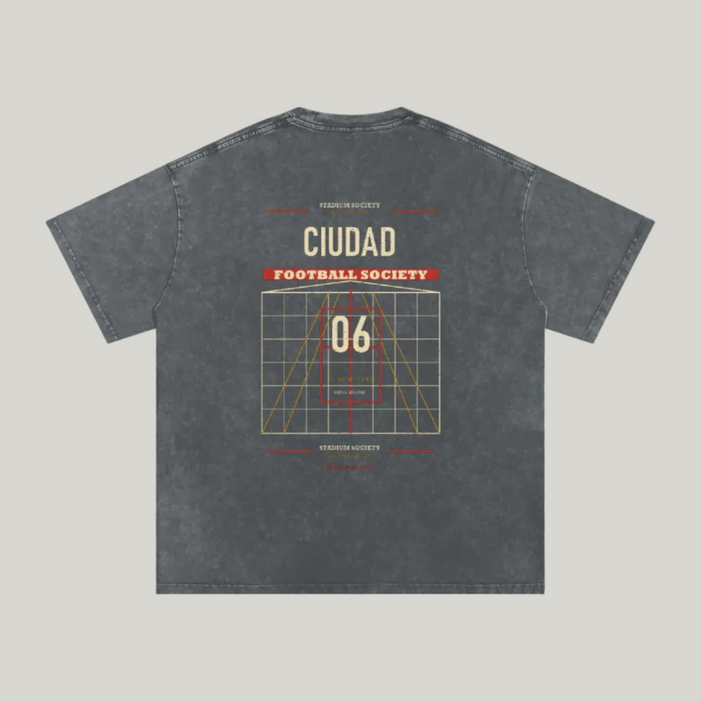 Back of Pirate Gray washed oversized T-shirt with a large Ciudad Football Society grid graphic