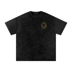Front of Black washed oversized T-shirt with a small Distrito Capital 90 chest graphic