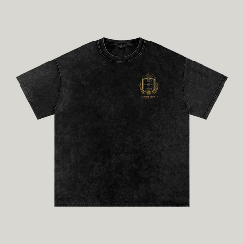 Front of Black washed oversized T-shirt with a small Distrito Capital 90 chest graphic