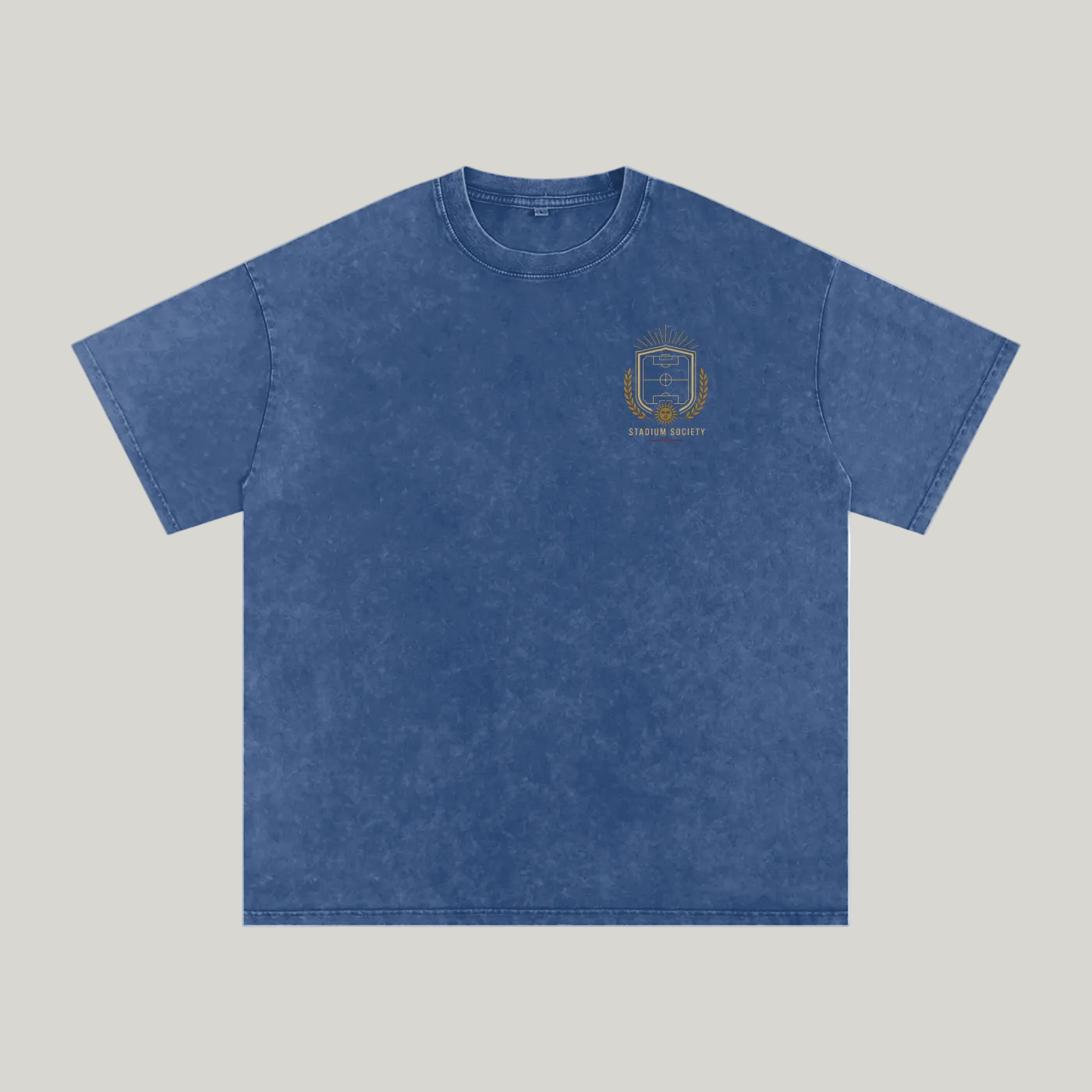 Front of Dark Blue washed oversized T-shirt with a small La Cancha Sagrada chest graphic