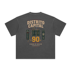 Back of Dark Gray enzyme-washed T-shirt with a large Distrito Capital 90 poster graphic