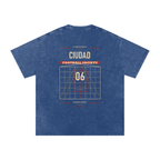 Back of Dark Blue washed oversized T-shirt with a large Ciudad Football Society grid graphic