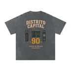 Back of Pirate Gray washed oversized T-shirt with a large Distrito Capital 90 poster graphic