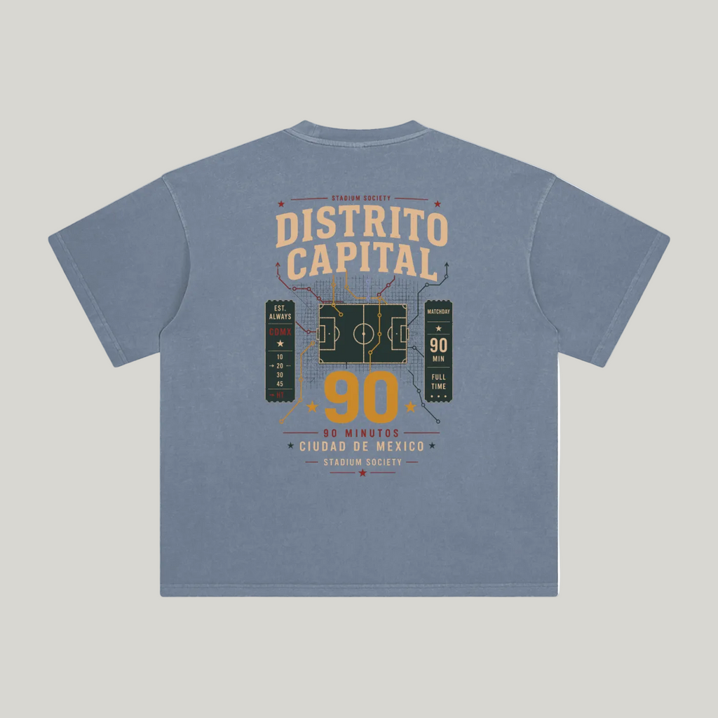 Back of Gray Blue enzyme-washed T-shirt with a large Distrito Capital 90 poster graphic
