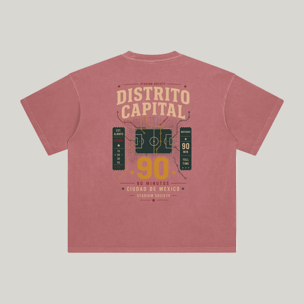 Back of Brick Red enzyme-washed T-shirt with a large Distrito Capital 90 poster graphic